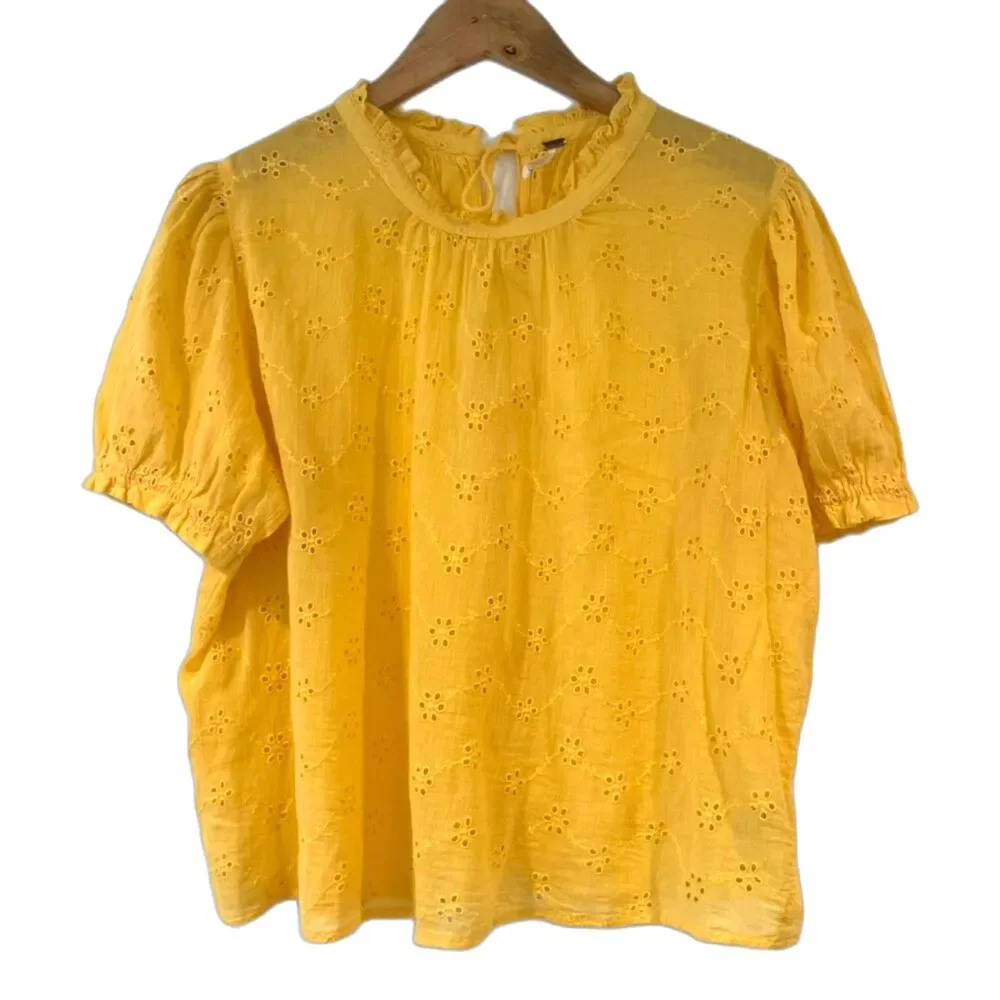 Free People Eyelet Tie-Back Blouse Nostalgic, romantic, vintage-inspired, airy